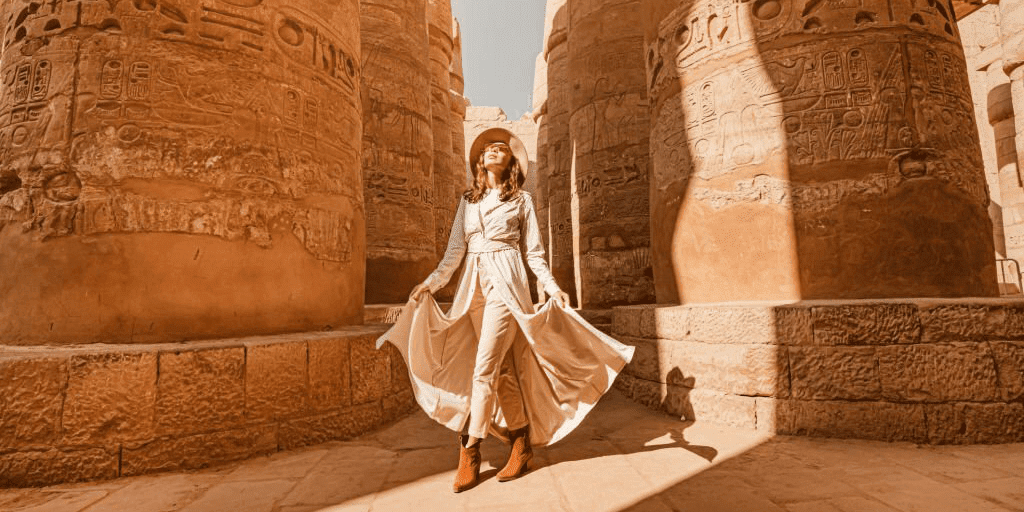 Woman exploring Karnak Temple on a luxury Luxor to Aswan and Red Sea vacation package - Luxor Day Trip from Hurghada