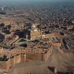 Aerial view of the massive stone walls and historic structures of the Saladin Citadel in Cairo.