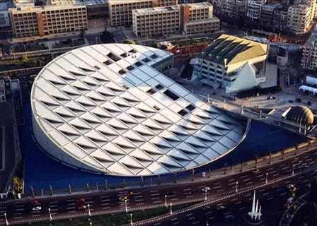 Modern circular architectural design of the Bibliotheca Alexandrina library roof viewed from above.