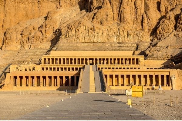 The magnificent three-tiered Mortuary Temple of Queen Hatshepsut carved into the limestone cliffs of Deir el-Bahari, Luxor West Bank.